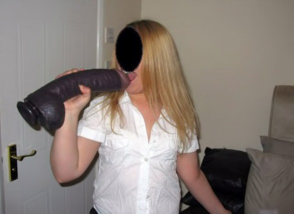 blonde wife using large black dildo