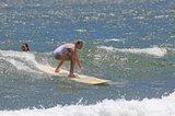 margot-robbie-in-swimsuit-surfing-in-hawaii-7-19-2016-7.jpg