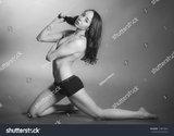 stock-photo-sexy-fit-woman-in-boy-shorts-319840334.jpg