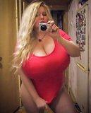 ksenia_a_aka_xenia_ataeva__blonde_busty_hourglass_russian_beauty_in_a_red_t_shirt_and_panties_...jpg