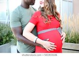 beautifully-love-pregnant-couple-interracial-260nw-501933106.jpg