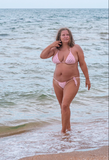 thick milf walk on the beach.png