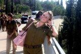 1024px-Female_soldier_poses_for_the_camera_in_Israel.JPG