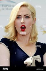 actress-charlotte-sullivan-who-stars-in-the-television-series-rookie-blue-reacts-during-a-phot...jpg