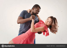 depositphotos_184715152-stock-photo-cute-interracial-couple-dancing-against.jpg