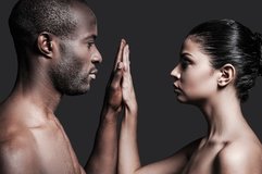 one-touch-one-love-portrait-shirtless-african-man-caucasian-woman-holding-their-hands-clasped-...jpg