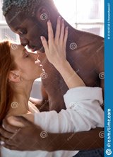 lovely-multi-ethnic-couple-hugging-each-other-have-rest-home-together-leisure-time-spend-weeke...jpg