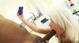 2670117-blonde-selfshot-with-her-handy-while-deepthroating-black.gif