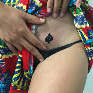 @ThaiQoS Showing Off Her Freshly Branded Permanent QoS Tattoo