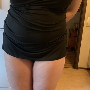 Just a little tittie and a short black dress