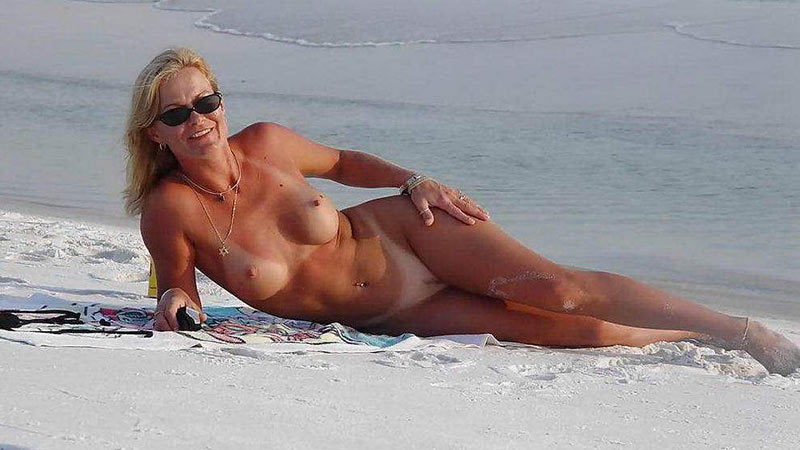 video-01-mature-wife-with-tan-lines-gets-horny-on-the-nudist-beach.jpg