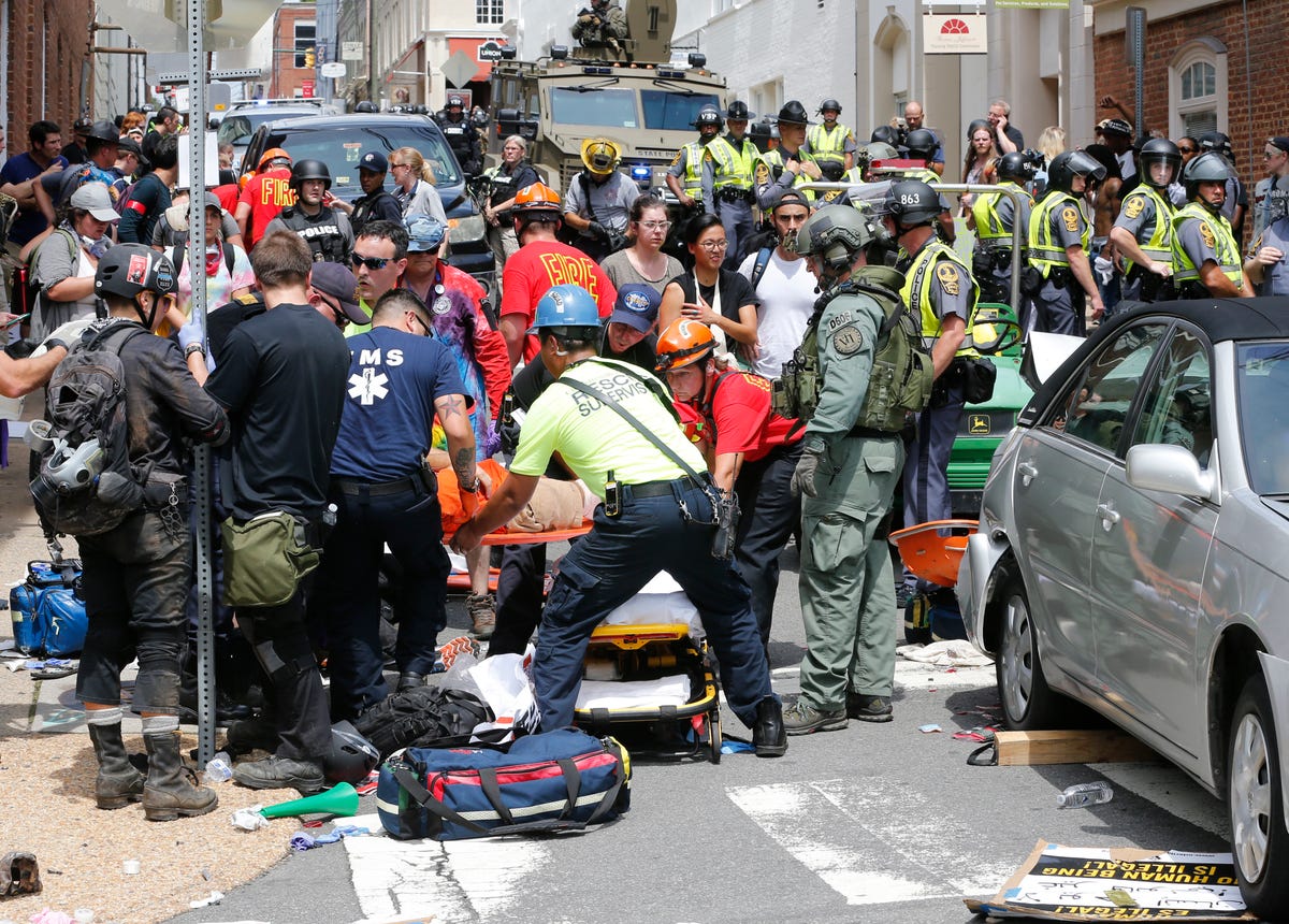 the-violence-came-to-a-head-when-a-driver-plowed-his-car-into-a-crowd-of-counter-protesters-killing-one-32-year-old-woman.jpg